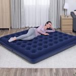 Inflatable mattress with an electric pump